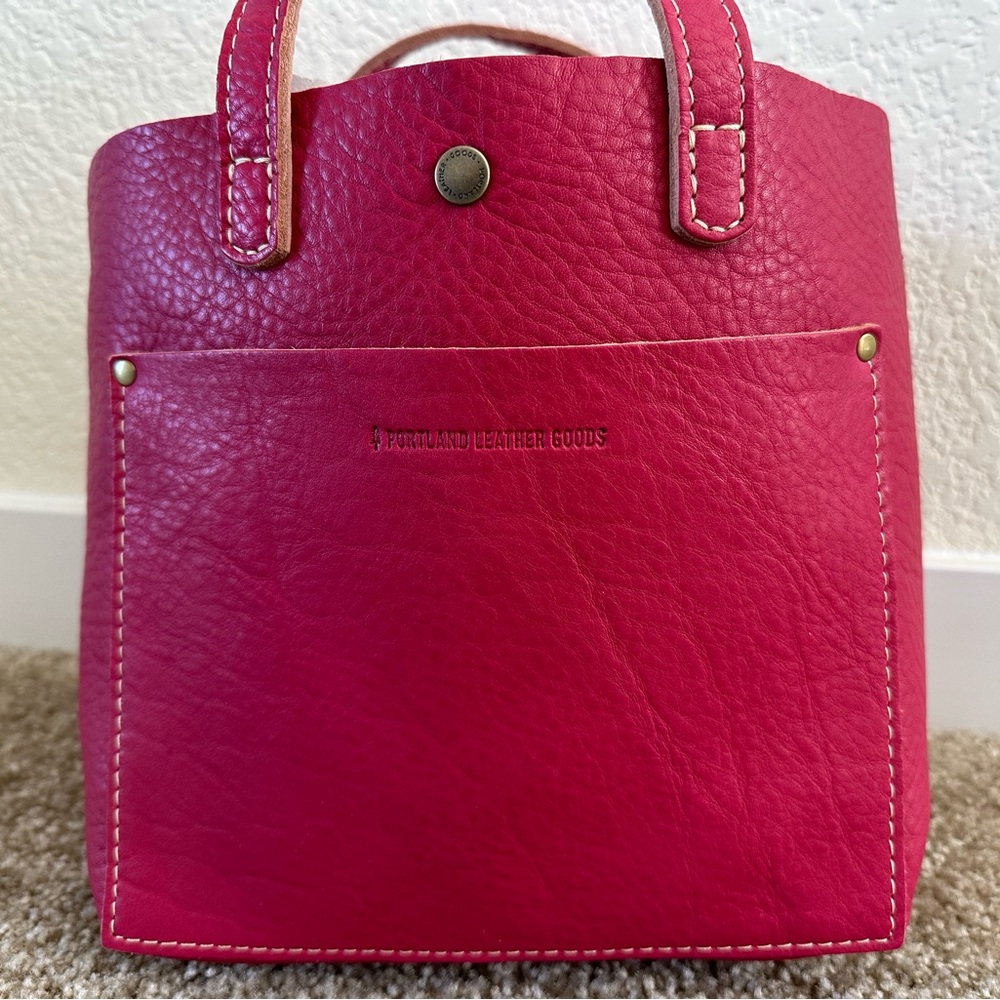 Brand New Portland Leather Mini Crossbody Tote in Pomegranate with snap closure.
